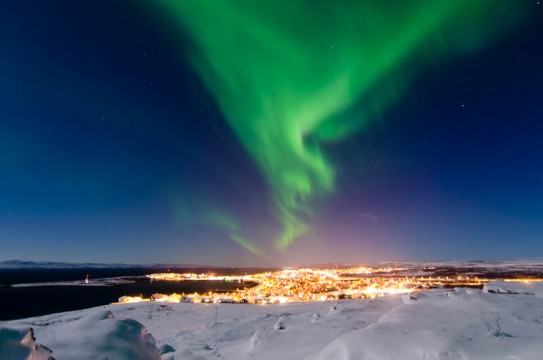 Vadsø Town under the Northern Lights ( photo Bjarne Riesto)